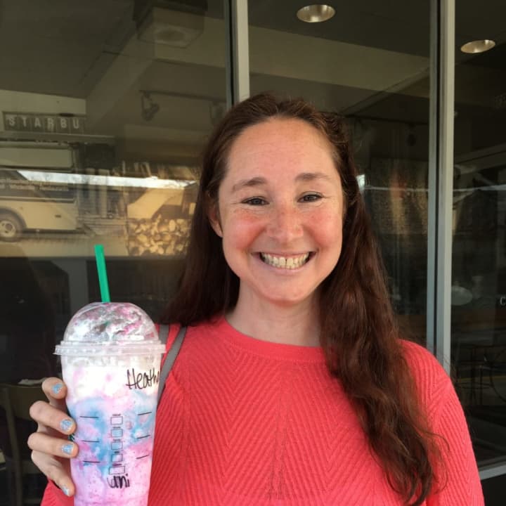 Heatherly Law shows off her Unicorn Frappuccino at the Starbucks in Trumbull.