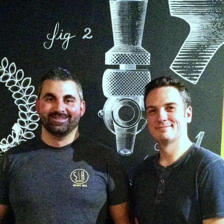 Justin Zeytoonian, left, and Mike Hofer of Smokehouse Tailgate Grill.