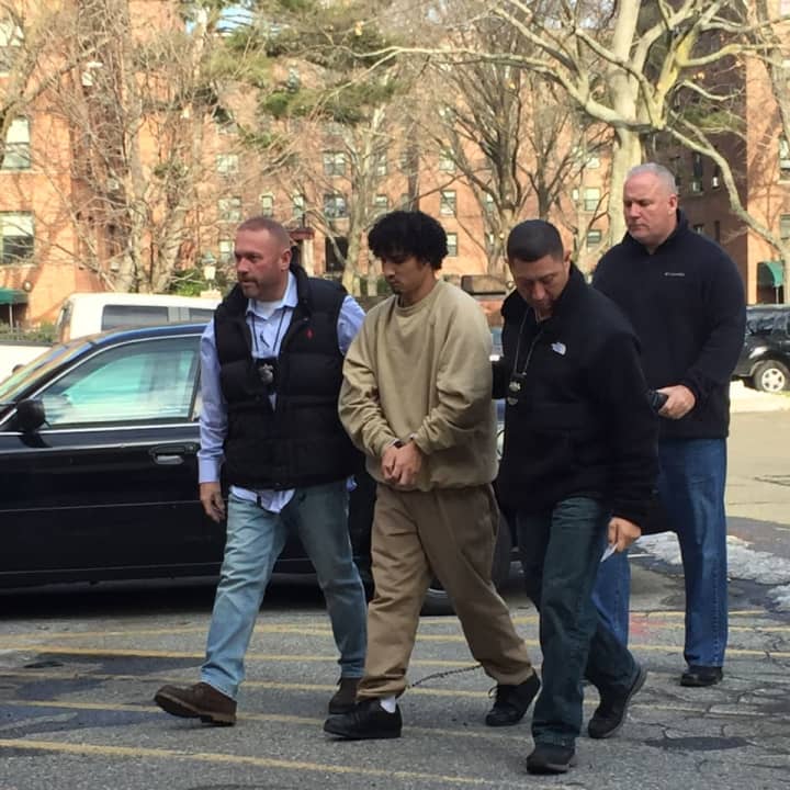 Elmer Gomez Ruano is returned to Stamford Thursday and charged with the murder of his wife in November.