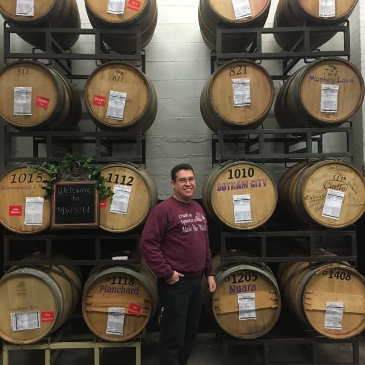 John Gizzi Jr. helps his father run &quot;Make Wine With Us&quot; in Wallington.
