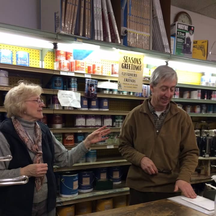 Evelyn Clough and her son Ron Clough Jr. working in their family business, Clough&#x27;s Hardware