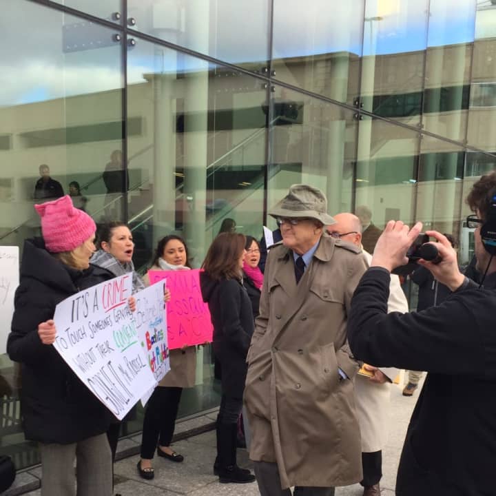 Protesters chant &#x27;do not touch without consent&#x27; as Greenwich RTM member Christopher von Keyserling arrives at the Stamford courthouse for  hearing on a fourth-degree sexual assault charge against him.