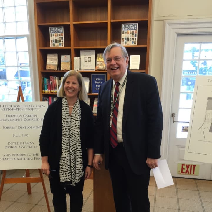 Stamford David Martin poses with Ferguson Library President Alice Knapp before they announced the opening of a new walkway at the library Tuesday.