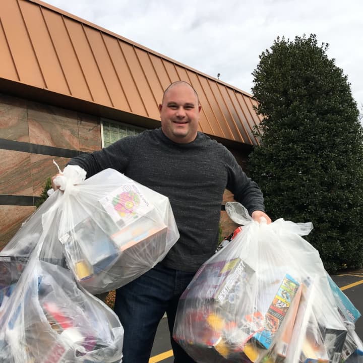 Vinny Rizzo of Allendale/Waldwick PBA 217 collects donations from local elementary schools for the annual Bergen County PBA Toy Drive.