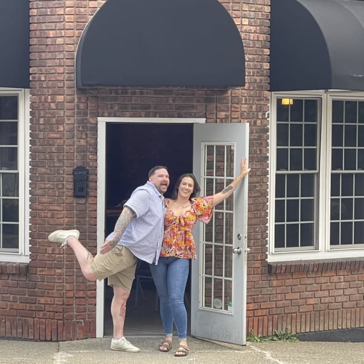 Two of the owners at the site of the new restaurant