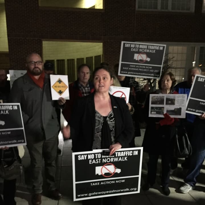Norwalk resident and 3rd Taxing District commissioner Deb Goldstein protests the design of the new East Avenue Bridge at city hall Tuesday evening.