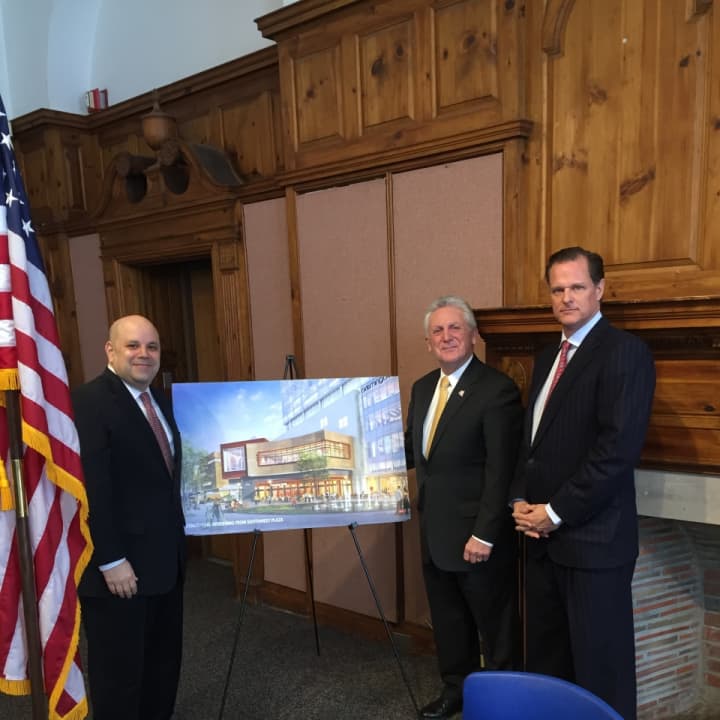 Norwalk Mayor Rilling stands with a representative from the city and General Growth Properties Wednesday at the signing of the land disposition agreement for The SoNo Collection.