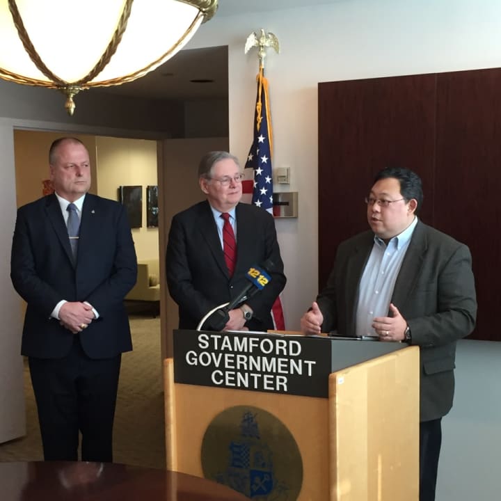 Dr. Henry Yoon, physician of record and medical advisor for the City of Stamford, address reporters during a press conference announcing Stamford Mayor David Martin&#x27;s melanoma treatment.