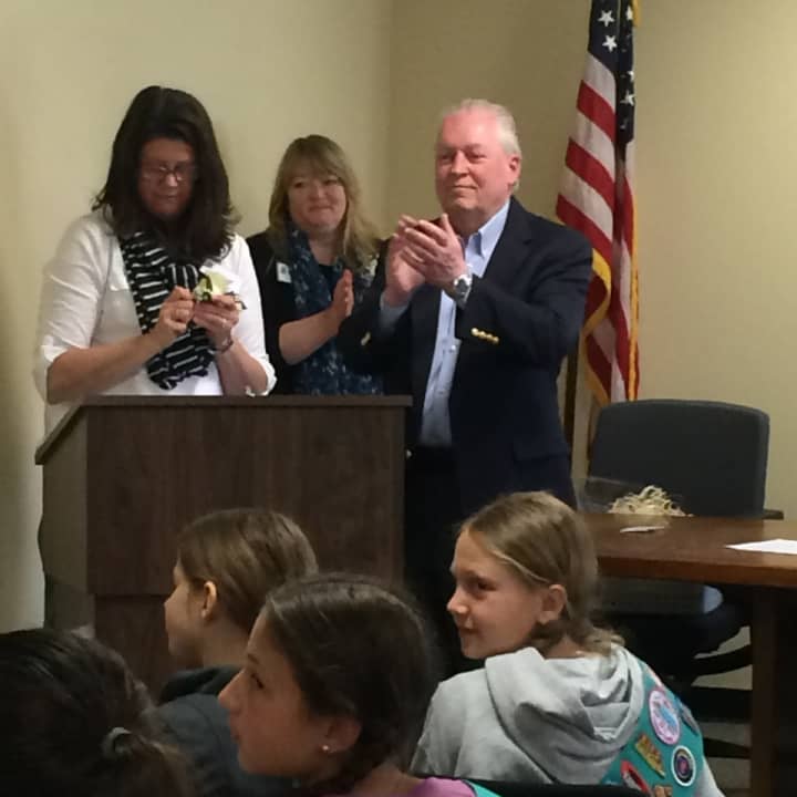 Fairfield First Selectman Michael Tetreau applauds an answer from one of the Girl Scouts who visited Independence Hall Wednesday.