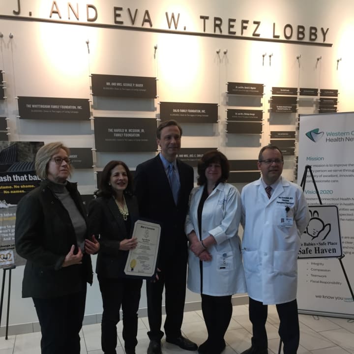 State Reps. Gail Lavielle, Fred Wilms and Terrie Wood along with Chairman of the Department of Emergency Medicine Dr. Benjamin Greenblatt and Patient Care manager Lorraine Salavec pose for a photo at Norwalk Hospital Monday.