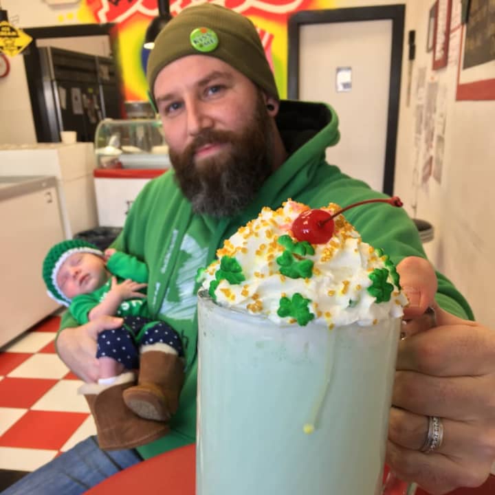 Matt Savage and baby Fiona with their Shamrock Shake at Benny&#x27;s Bakery and Ice Cream Shoppe in Fair Lawn.