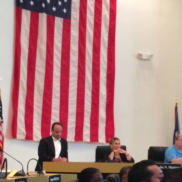 Mayor Joe Ganim arrives to thunderous boos at Tuesday night&#x27;s City Council meeting.