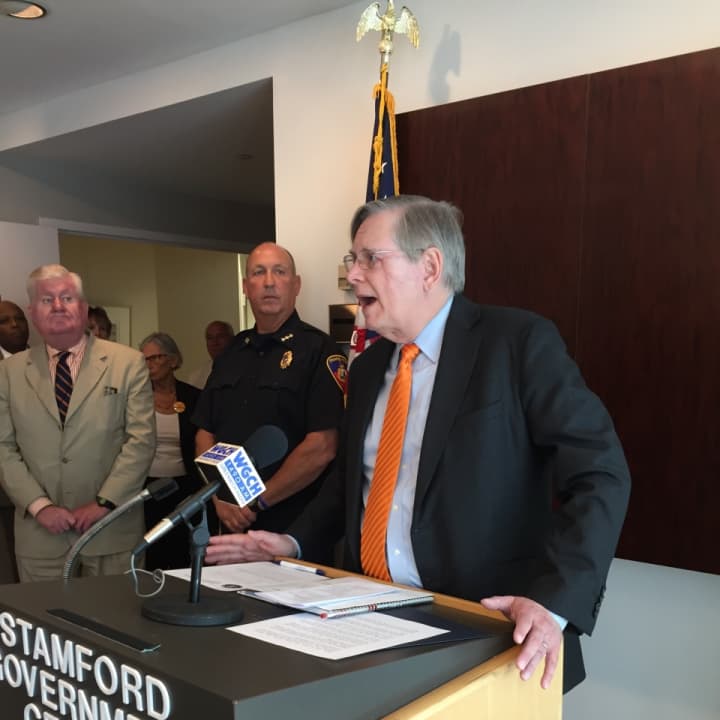 Here, Stamford Mayor David Martin called for an end to violence and for universal background checks during a June event.