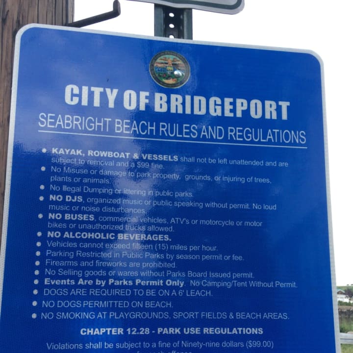 New signs at tiny Seabright Beach in Black Rock have residents up in arms.