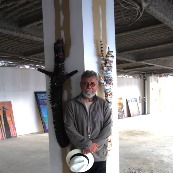 Lee Romero, a retired New York Times photographer, Pulitzer Prize winner and now a full time artist with a studio in the new Carpet Mills Arts District.