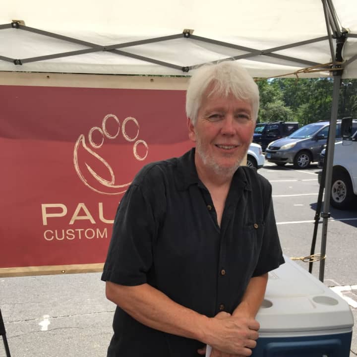 Paul Gallant stands in front of his Paul&#x27;s Custom Pet Food at the Westport Farmers Market last Thursday afternoon.