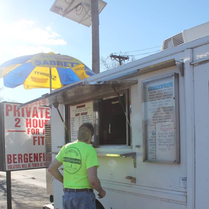 A regular customer waits for his hotdog order in Bergenfield at Mark&#x27;s Hot Dogs. 