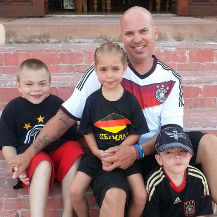 Jeff Leider of Elmwood Park poses with his children Jason, Jordan and Justin.