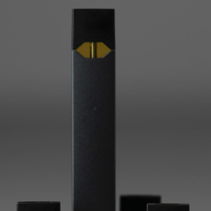 A Juul e-cigarette and pods