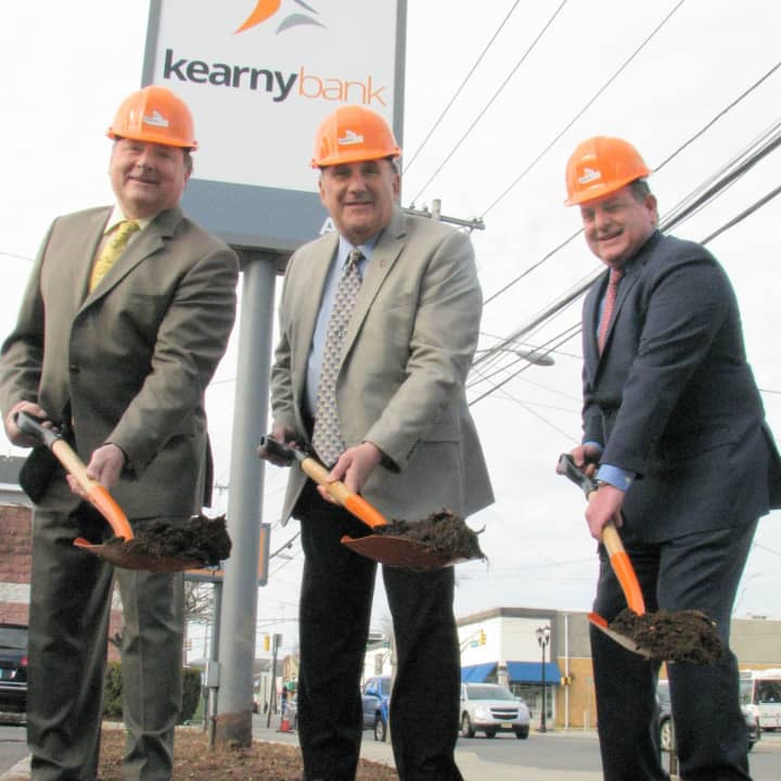 From left to right: John Mazur, Mayor Joseph Bianchi, and Craig Montanaro break ground at Kearny Bank’s North Arlington branch.