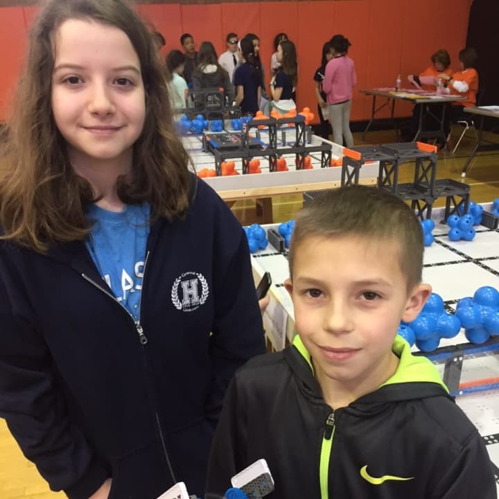 Left to right: Harvey School students Wendy Lichtenberg and Clayton Collum. The students are in a middle school robotics program.