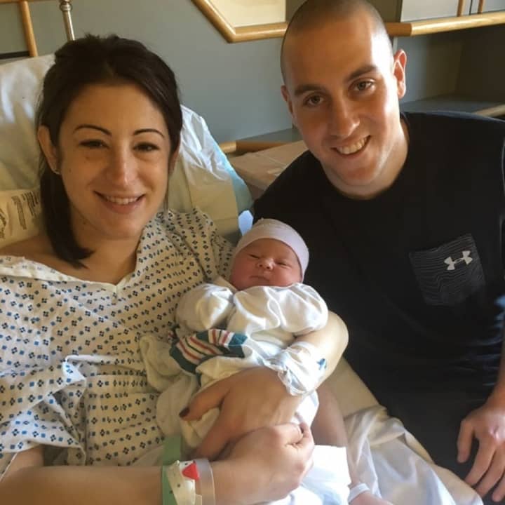 New parents Amanda and Matt Simone with their baby girl Sophia Rae Simone.
