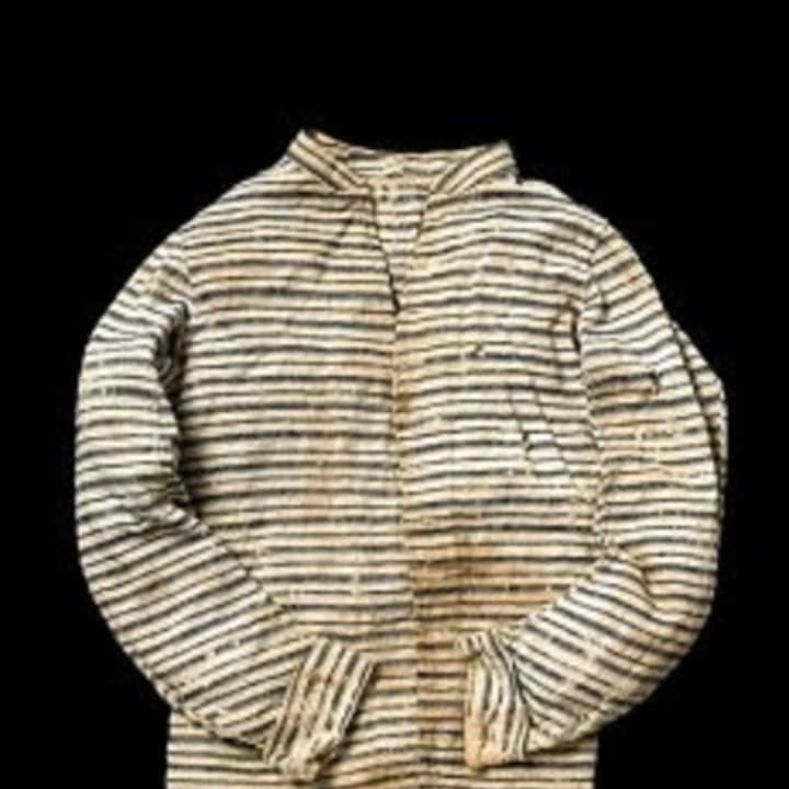 A shirt worn by Obadiah Mead, shot by a loyalist &quot;cowboy,&quot; connects visitors with the American Revolution. 