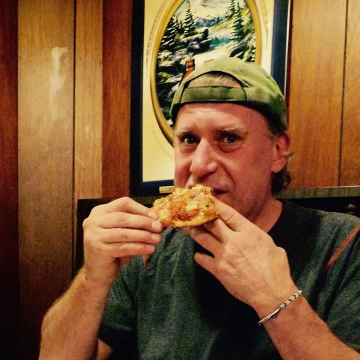 James Romaglio of Fair Lawn enjoying a bar pie at Kinchley&#x27;s Tavern in Ramsey. 