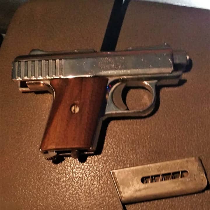 Port Authority police said they found the .25-caliber semi-automatic pistol in the glove compartment and the knife in the rear of the SUV.