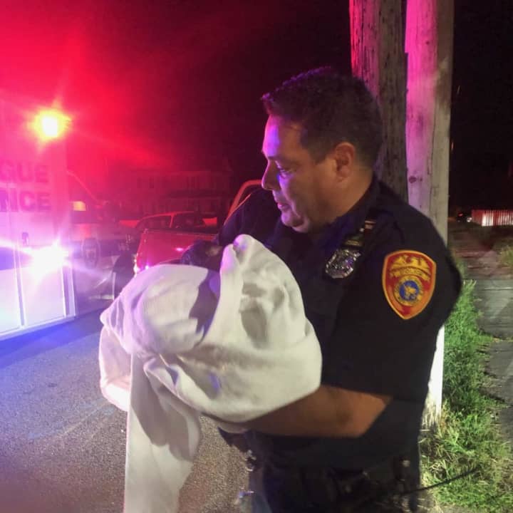 Officer Robert Burgos helped deliver a baby girl in Patchogue.