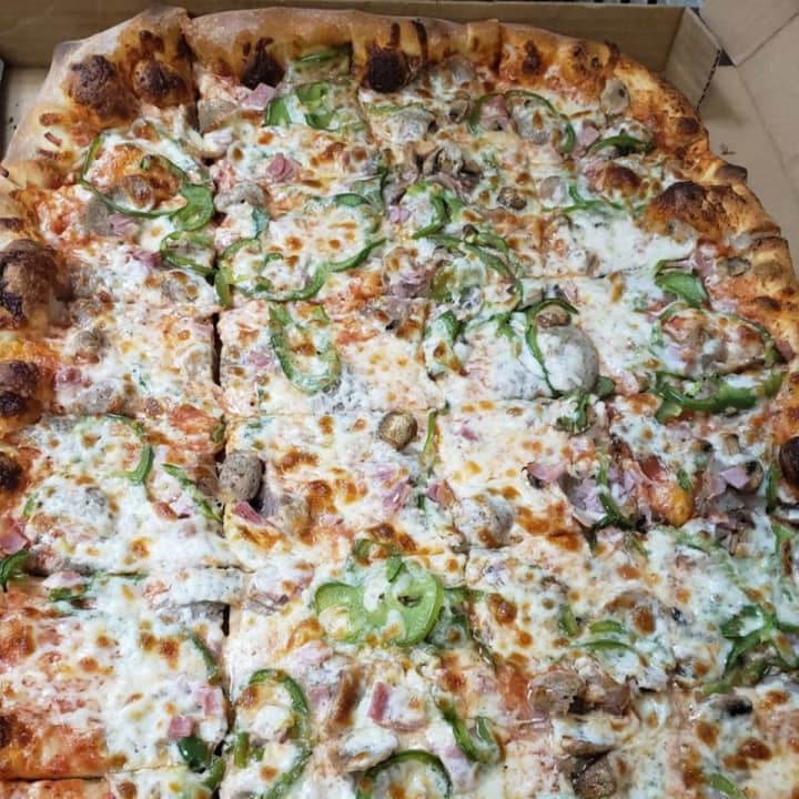 A pie with peppers, mushrooms, sausage and ham from Peppo&#x27;s Pizza in Agawam.