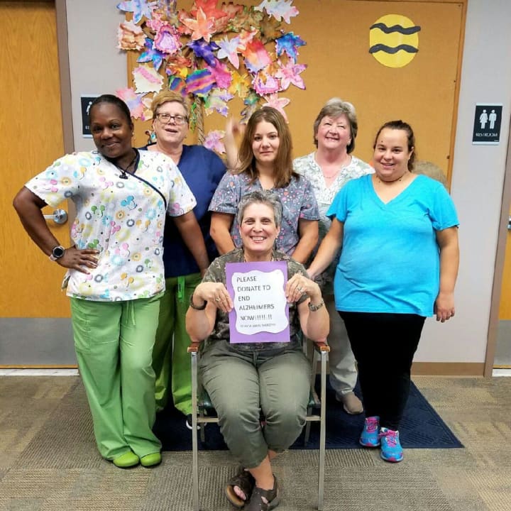 Donna Lombardi Slavin, seated, captain of the Team Always There, poses with team members Tonika Simmons, Jane Fuchs, Ashley Quick, Sheila Wicklow and Nicole Kaufmann.