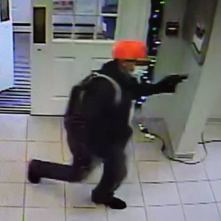 Police are searching for a suspect accused of robbing a bank in Connecticut at gunpoint.