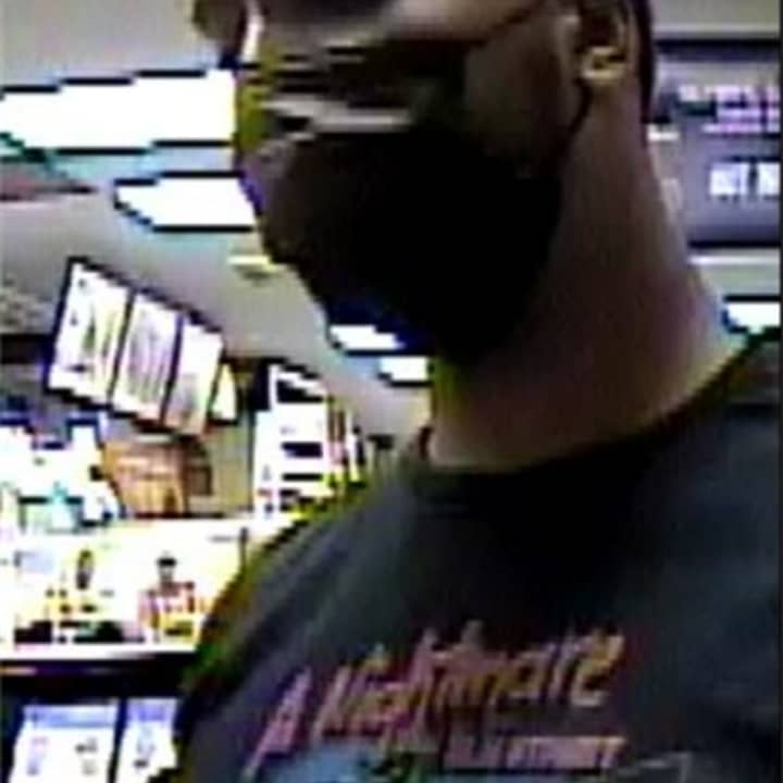 Authorities are asking the public for help as they search for a man accused of using a stolen credit card at a Long Island store.