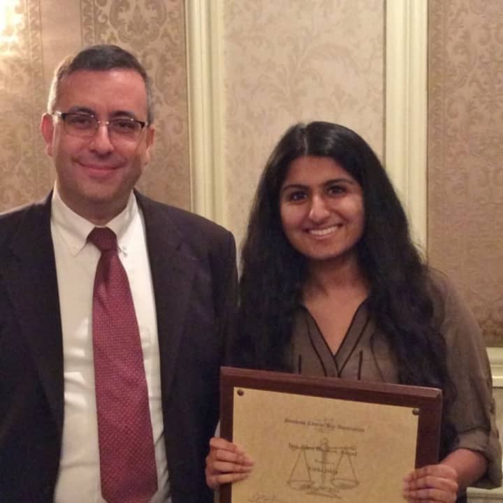 Our Lady of Lourdes senior Katha Sikka and Our Lady of Lourdes&#x27; Mock Trial team&#x27;s attorney coach Assistant District Attorney Frank Petramale.