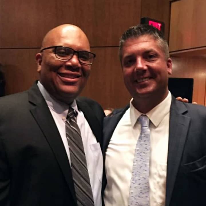 Reggie Richardson and John Barnes (left and right) were two of the 35 granted tenure last Tuesday. They are the principals of New Rochelle High School and Albert Leonard Middle School.
