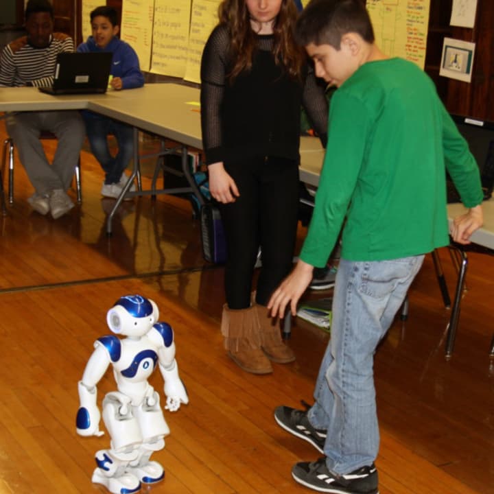 This robot from the Lower Hudson Regional Information Center is visiting with sixth-graders at Eastview Middle School in White Plains.