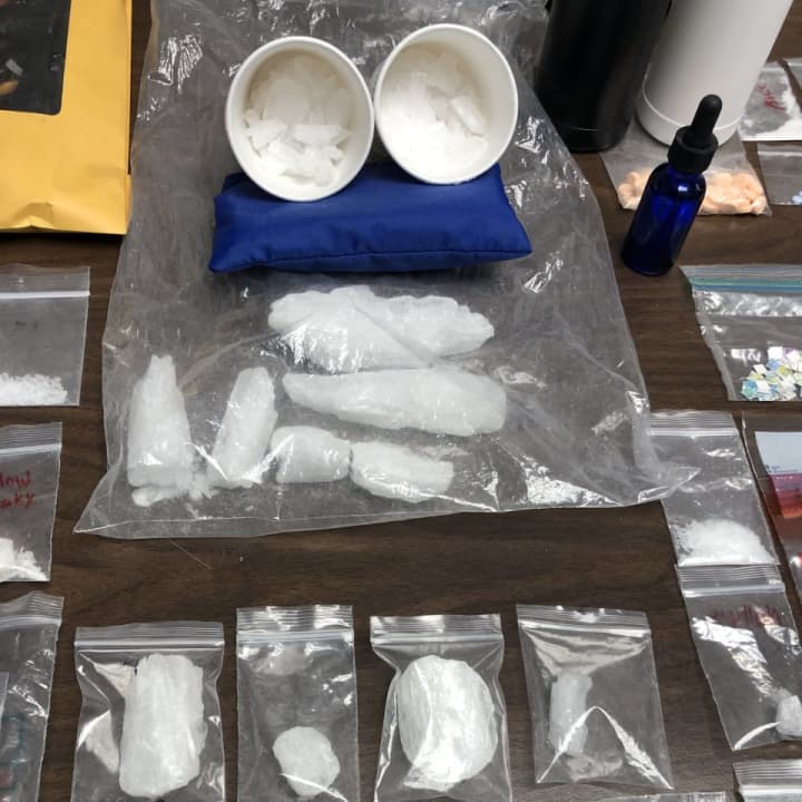 A Nassau County woman was busted for alleged possession of crystal meth and a host of other drugs.