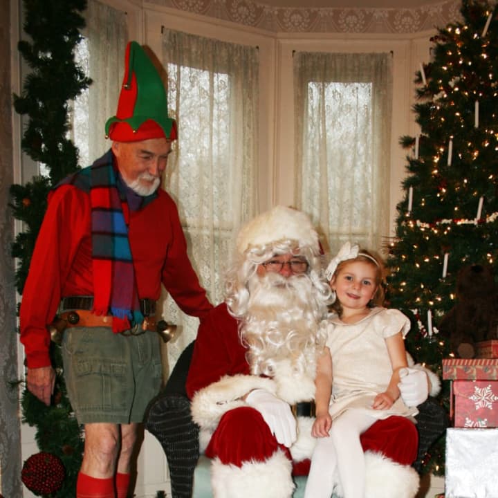 Madigan O’Shea with Santa and his helper