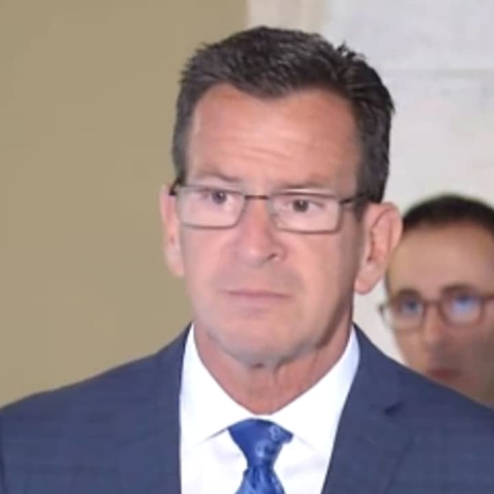 Gov. Dannel Malloy answers questions about GE during a press conference Monday. 