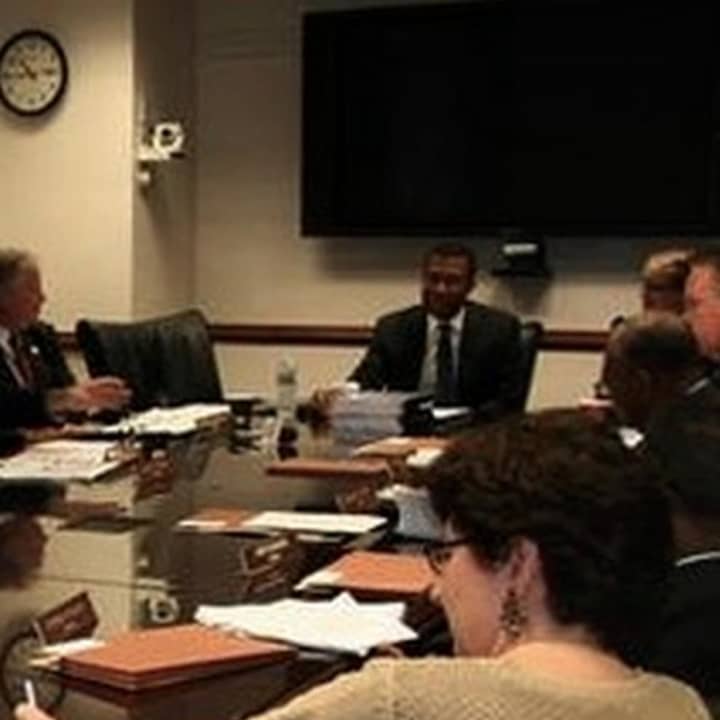 Federal Housing Monitor James Johnson (far end of table) at a meeting with the Westchester County Board of Legislators.