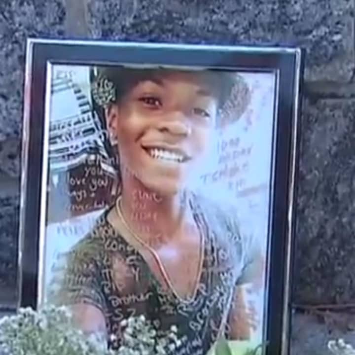 A photograph of Tahj Robinson in an impromptu memorial set up near Barhardt Park by friends of the slain teen.
