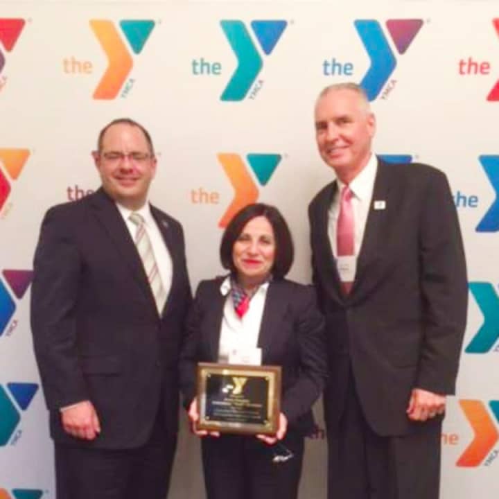 Connecticut Alliance of YMCAs Executive Director John Cattelan, left, Sen. Toni Boucher , and Riverbrook Regional YMCA CEO Bob McDowell., right. The Connecticut Alliance of YMCAs has named Sen. Boucher its “Legislator of the Year.”