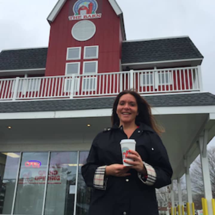 Owner Aegina Angeliades stands in front of The Barn, her newly opened drive-through grocery store on East Main Street. The Barn is a Long Island, N.Y., institution and Stamford is the first location outside of Long Island.