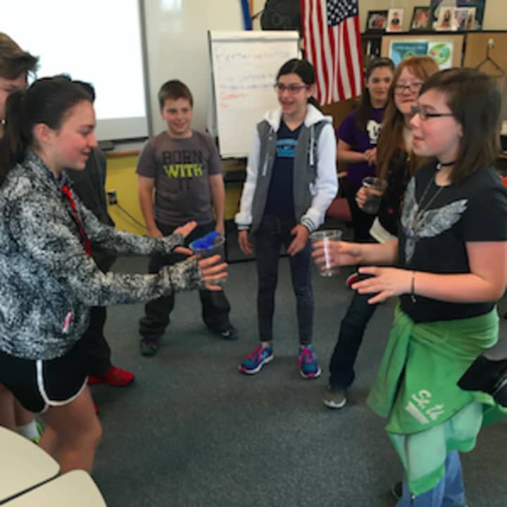 Sixth-graders at New Fairfield Middle School participating in an activity that is part of the Wingman program. It was started by Ian and Nicole Hockley, parents of 6-year-old Dylan,who was killed in the December 2012 Sandy Hook School shooting.
