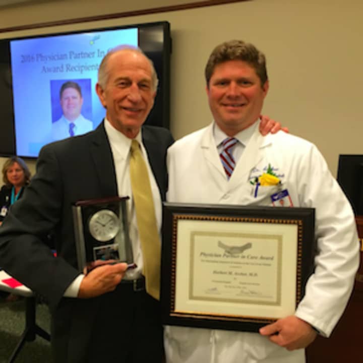 Herbert Archer, MD, Greenwich Hospital’s “Physician Partner in Care Award” winner, with Spike Lipschutz, MD, chief medical officer and senior vice president of the medical staff.