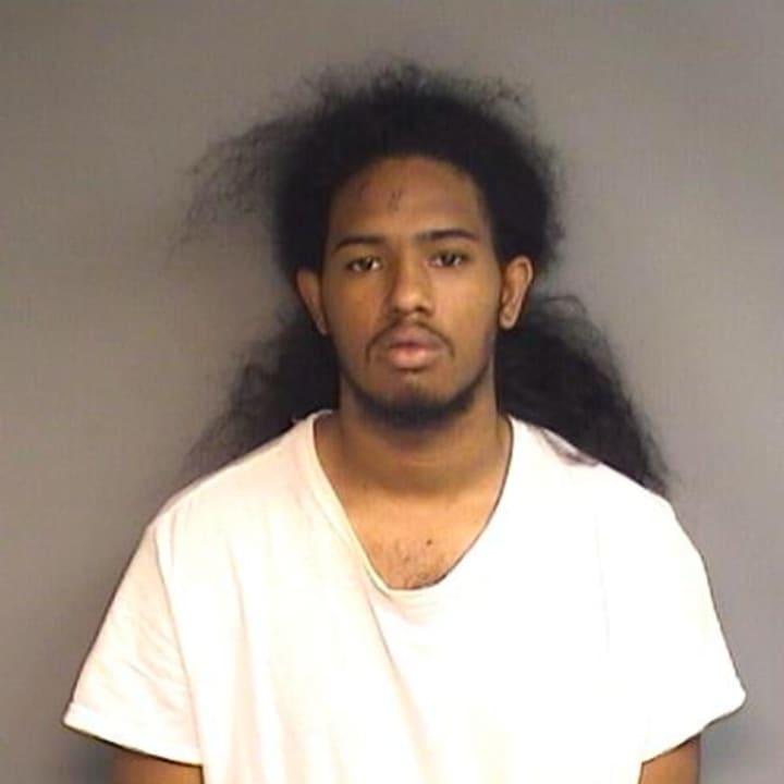 Shacquine Narine, pictured, and a 17-year-old male, both of Stamford, are facing charges in a shooting on May 30.