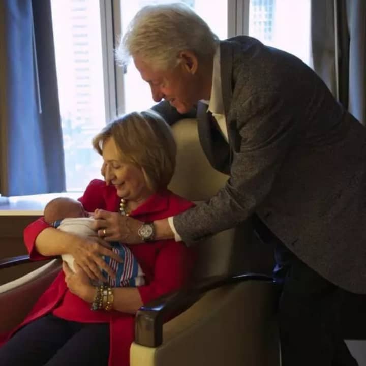 Chappaqua&#x27;s Hillary and Bill Clinton with their first grandchild, Charlotte, in September 2014.