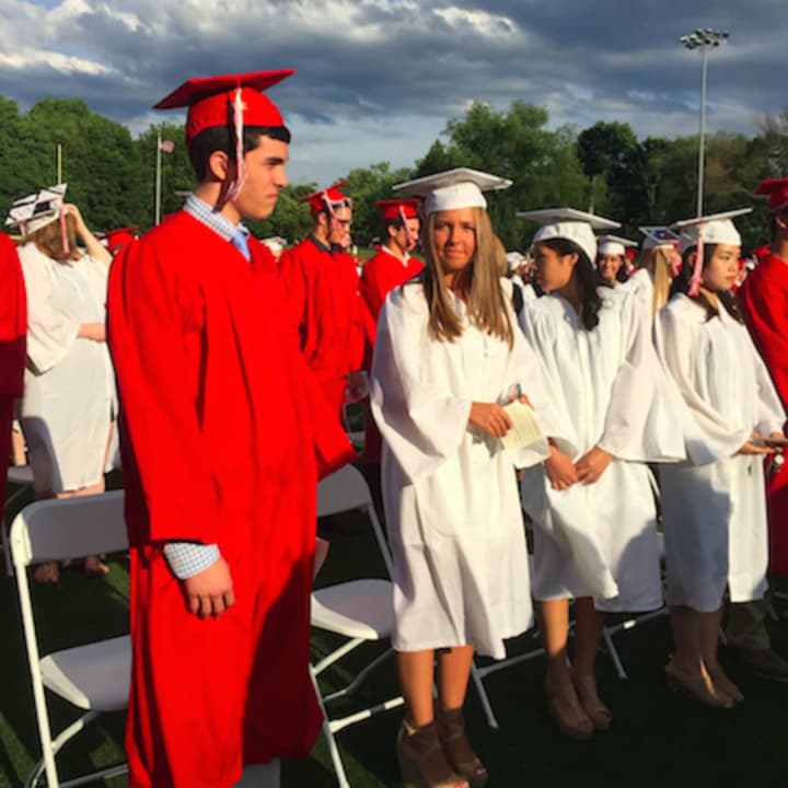 Greenwich High School students line up for the school&#x27;s 147th commencement ceremony Tuesday.