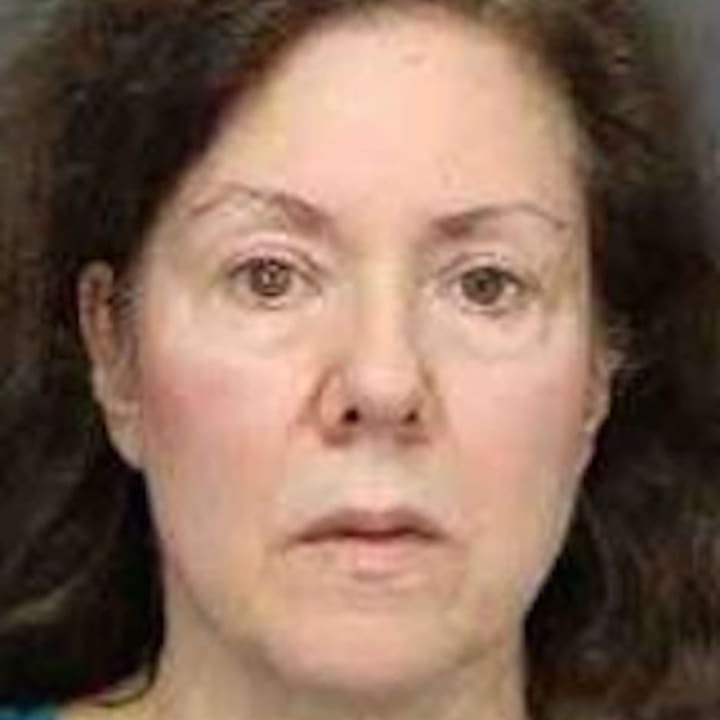 June Ann Swartz, a former Harrison High School teacher, allegedly owes more than $11,000 in state taxes, according to Westchester County prosecutors.